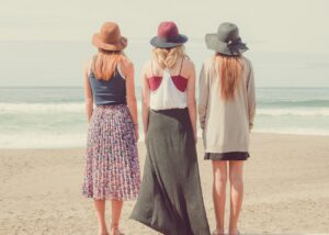 beach, women, shore, seashore, sand, sandy beach, nature, friends, friendship, stand, standing, together, fashion, style, stylish women, hats, summer, summer vacation, holiday, ocean, people, sea, water, three, models